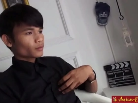 Young Asian boy with tattoos, THIAN, in solo pleasure dance.